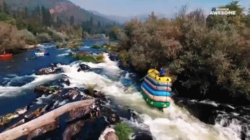 An Aerial View Of A River With The Words " Awesome " On The Bottom Right GIF