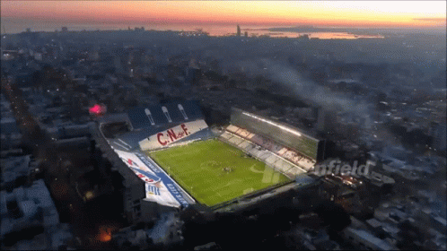 An Aerial View Of A Soccer Stadium With The Letters Cnf On The Side GIF