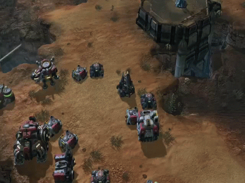 An Aerial View Of A Video Game Where A Robot Is Being Destroyed By A Group Of Smaller Robots GIF