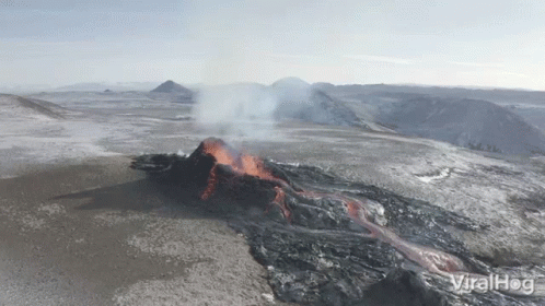 An Aerial View Of A Volcano That Says Viralhog GIF