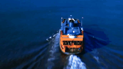 An Aerial View Of The New York City Skyline With The Twin Towers In The Distance GIF