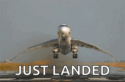 An Airplane Is Taking Off From A Runway And The Words Just Landed Are Below It GIF