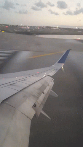 An Airplane Wing With The Letter U On The Bottom GIF