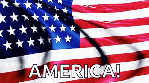 An American Flag Is Waving In The Wind With The Words America Written On The Bottom GIF