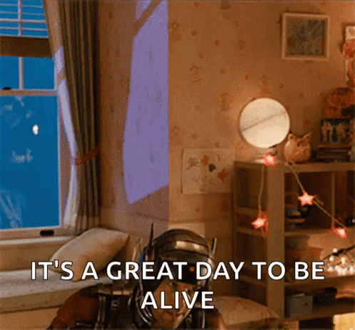 An Ant Man Says It 'S A Great Day To Be Alive In Front Of A Window GIF