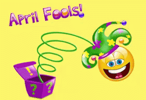An April Fools Greeting Card With A Smiley Face Coming Out Of A Box GIF