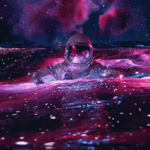 An Astronaut In A Space Suit Is Floating In A Galaxy GIF