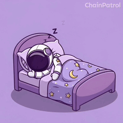 An Astronaut Is Sleeping In A Bed With A Purple Blanket GIF