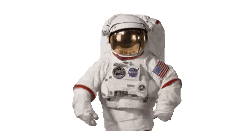 an astronaut wearing a nasa space suit is walking