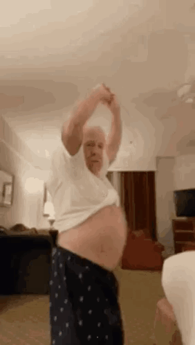 Elderly Man Dancing In Living Room GIF