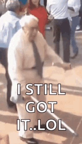 An Elderly Man With A Cane Is Dancing In Front Of A Crowd And Says I Still Got It Lol . GIF