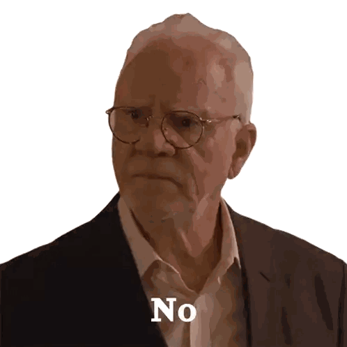 an elderly man with glasses and a suit says no