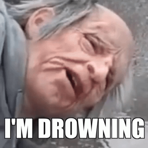 An Elderly Woman Is Drowning In A Pool Of Water . GIF