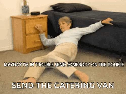 An Elderly Woman Is Laying On The Floor With The Caption " Mayday I 'M In Trouble " GIF