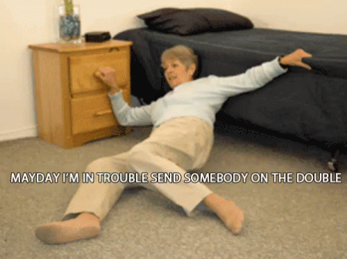 An Elderly Woman Is Laying On The Floor With The Words Mayday I 'M In Trouble Send Somebody On The Double GIF