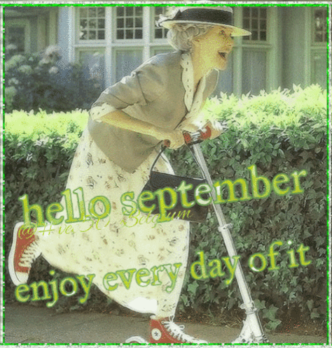 An Elderly Woman Is Riding A Scooter With The Words Hello September Enjoy Every Day Of It Below Her GIF