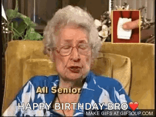 An Elderly Woman Is Sitting In A Chair And Saying `` All Senior Happy Birthday Bro `` . GIF