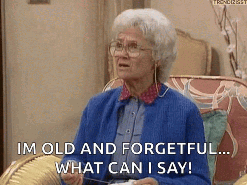 An Elderly Woman Is Sitting In A Chair And Saying I 'M Old And Forgetful What Can I Say ! GIF