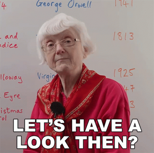 Elderly Woman Sitting In Front Of White Board Let's Have A Look GIF