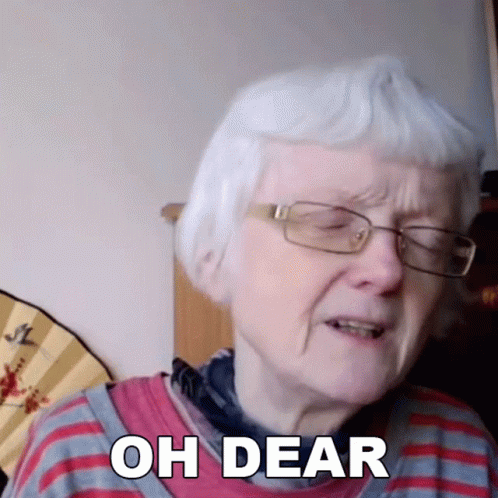 An Elderly Woman Wearing Glasses And A Red And Blue Striped Shirt Says Oh Dear GIF