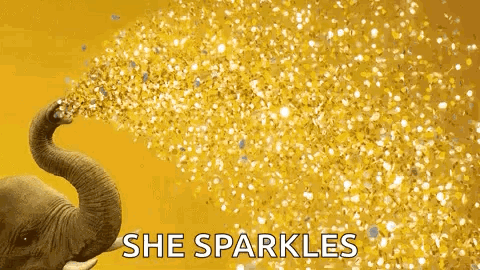 An Elephant Is Blowing Gold Confetti Out Of Its Trunk On A Yellow Background . GIF