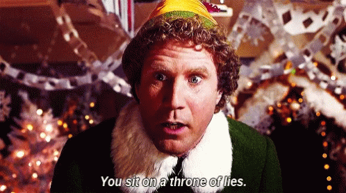 An Elf Says You Sit On A Throne Of Lies In Front Of Christmas Trees GIF