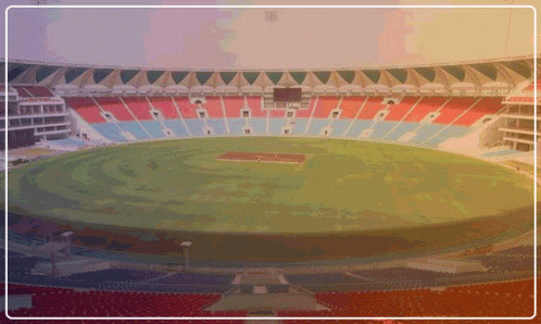 An Empty Stadium With Red Blue And White Seats GIF