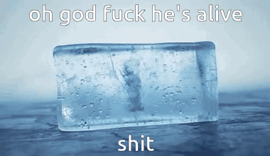 An Ice Block With The Words Oh God Fuck He 'S Alive Shit On It GIF