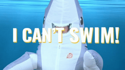 An Inflatable Shark Says " I Can 'T Swim " GIF