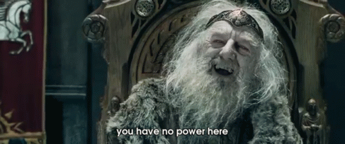 An Old Man With A Beard Is Sitting In A Chair And Says You Have No Power Here . GIF