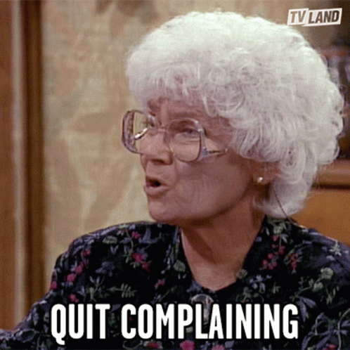 An Old Woman With Glasses Says Quit Complaining In A Tv Land Ad GIF
