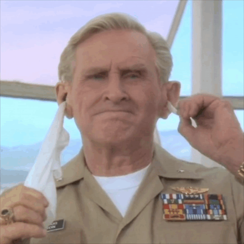 an older man in a military uniform has a name tag that says james