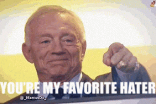 An Older Man In A Suit And Tie Is Pointing At The Camera And Says You 'Re My Favorite Hater . GIF