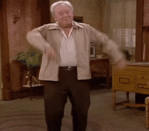 Older Man In Tan Jacket Dancing GIF