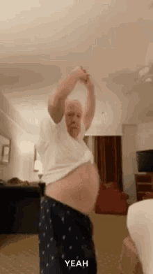 Older Man Dancing Holding Shirt Up GIF
