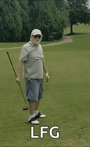 An Older Man Is Holding A Golf Club On A Golf Course And The Words Lfg Are Below Him GIF