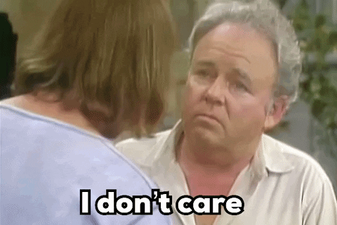 Older Man Telling Woman I Don't Care GIF