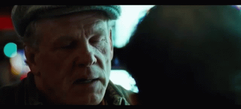An Older Man Says I 'M Really Trying Here In A Movie Scene GIF
