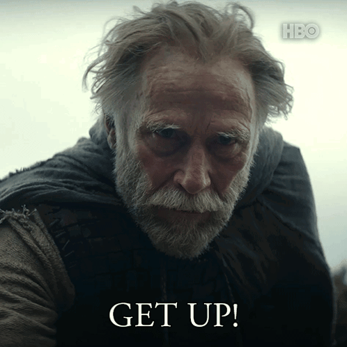 An Older Man With A Beard And A Scarf Says Get Up GIF