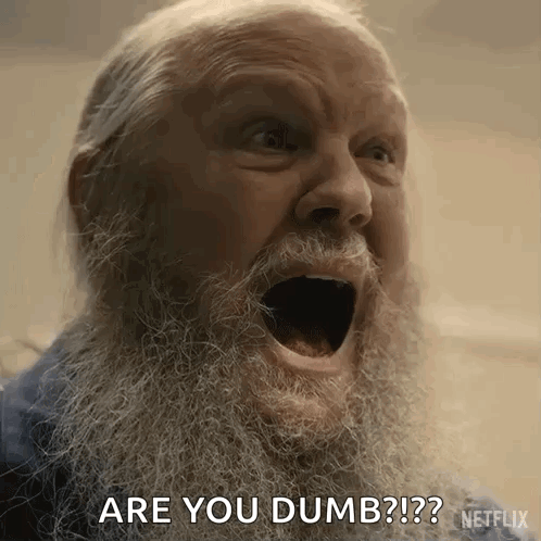 An Older Man With A Beard Is Screaming With His Mouth Open And Asking Are You Dumb ? GIF