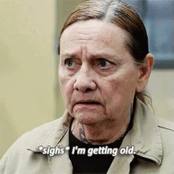 An Older Woman Is Making A Funny Face And Saying I 'M Getting Old . GIF