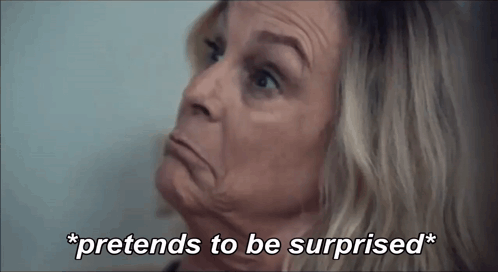 An Older Woman Is Making A Funny Face And Says `` Pretends To Be Surprised '' . GIF