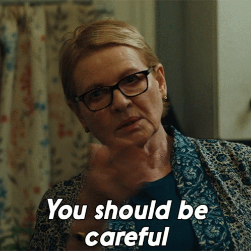 An Older Woman Wearing Glasses Says " You Should Be Careful " GIF
