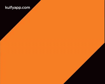 An Orange And Black Wicke Logo With A Cricket Ball In The Middle GIF