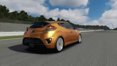 An Orange Hyundai Car Is Driving On A Track GIF