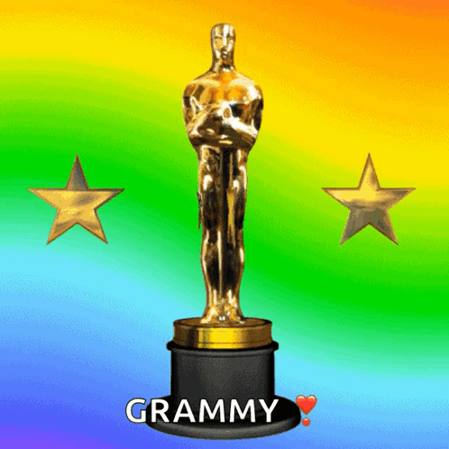 An Oscar Statue With The Word Grammy On The Base GIF
