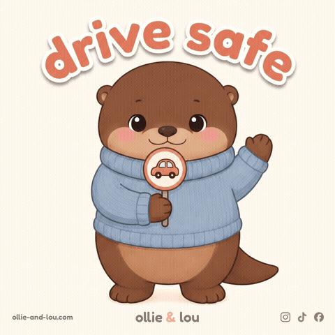 An Otter Wearing A Blue Sweater Holds A Sign That Says Drive Safe GIF