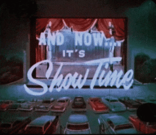 And Now It 'S Show Time Is Displayed On A Screen GIF
