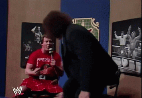 Andre The Giant Man Handles Rowdy Piper GIF