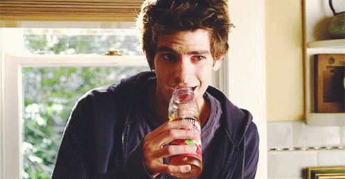 Andrew Garfield Spiderman Smirk Drinking GIF